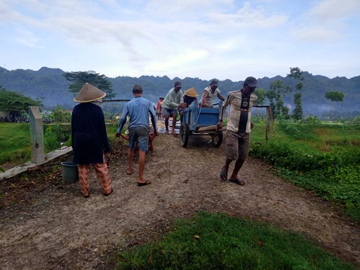 KERJA BAKTI PENGURUGAN TANGGUL SUNGAI JATINEGARA 01